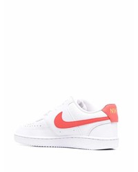 Baskets basses en cuir blanc et rouge Nike