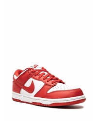 Baskets basses en cuir blanc et rouge Nike