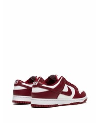 Baskets basses en cuir blanc et rouge Nike