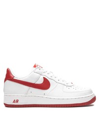 Baskets basses en cuir blanc et rouge Nike