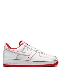 Baskets basses en cuir blanc et rouge Nike