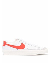 Baskets basses en cuir blanc et rouge Nike