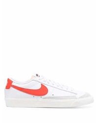 Baskets basses en cuir blanc et rouge Nike