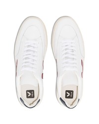 Baskets basses en cuir blanc et rouge Veja