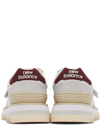 Baskets basses en cuir blanc et rouge New Balance