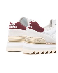 Baskets basses en cuir blanc et rouge New Balance