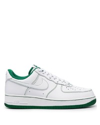 Baskets basses en cuir blanc et vert Nike