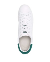 Baskets basses en cuir blanc et vert adidas