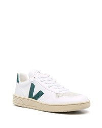 Baskets basses en cuir blanc et vert Veja