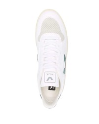 Baskets basses en cuir blanc et vert Veja