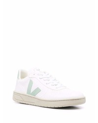 Baskets basses en cuir blanc et vert Veja