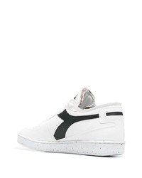 Baskets basses en cuir blanches et noires Diadora