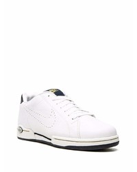 Baskets basses en cuir blanches et noires Nike