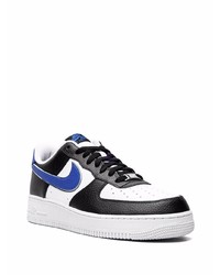 Baskets basses en cuir blanches et noires Nike