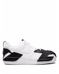 Baskets basses en cuir blanches et noires Nike