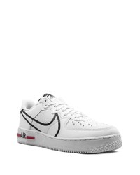 Baskets basses en cuir blanches et noires Nike