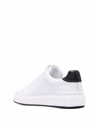 Baskets basses en cuir blanches et noires Balmain