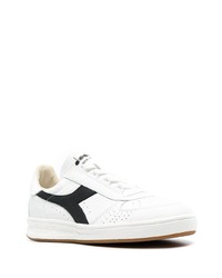 Baskets basses en cuir blanches et noires Diadora