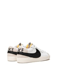 Baskets basses en cuir blanches et noires Nike