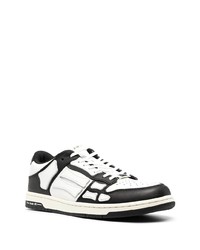 Baskets basses en cuir blanches et noires Amiri