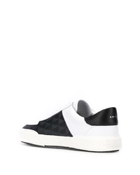 Baskets basses en cuir blanches et noires Amiri