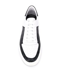 Baskets basses en cuir blanches et noires Amiri