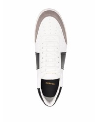 Baskets basses en cuir blanches et noires Sandro