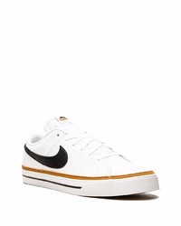 Baskets basses en cuir blanches et noires Nike