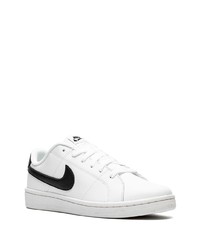 Baskets basses en cuir blanches et noires Nike