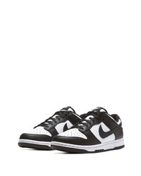 Baskets basses en cuir blanches et noires Nike