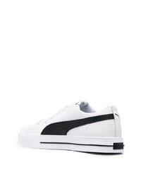 Baskets basses en cuir blanches et noires Puma