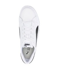 Baskets basses en cuir blanches et noires Puma