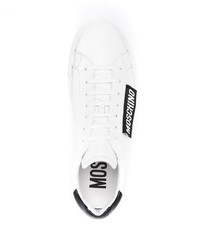 Baskets basses en cuir blanches et noires Moschino