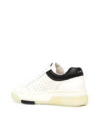 Baskets basses en cuir blanches et noires Amiri