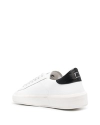 Baskets basses en cuir blanches et noires D.A.T.E