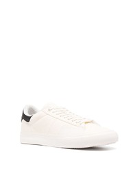 Baskets basses en cuir blanches et noires Heron Preston