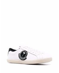 Baskets basses en cuir blanches et noires Moncler