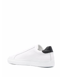 Baskets basses en cuir blanches et noires Moschino