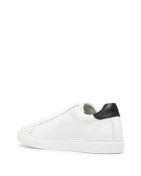 Baskets basses en cuir blanches et noires Moschino