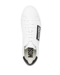 Baskets basses en cuir blanches et noires Moschino