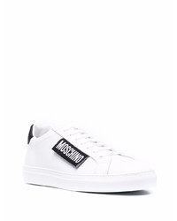 Baskets basses en cuir blanches et noires Moschino