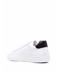 Baskets basses en cuir blanches et noires Moschino