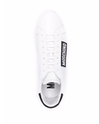 Baskets basses en cuir blanches et noires Moschino