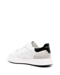 Baskets basses en cuir blanches et noires Premiata