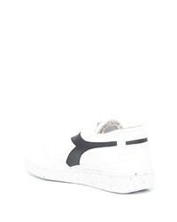 Baskets basses en cuir blanches et noires Diadora