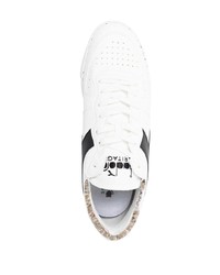 Baskets basses en cuir blanches et noires Diadora