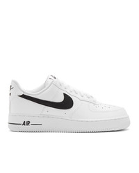 Baskets basses en cuir blanches et noires Nike