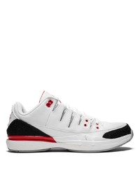 Baskets basses en cuir blanches et noires Nike