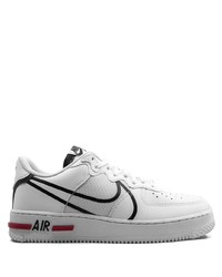 Baskets basses en cuir blanches et noires Nike