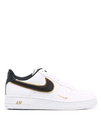 Baskets basses en cuir blanches et noires Nike